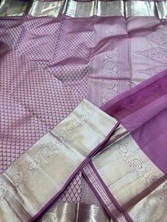 Experience the elegance and luxury of our Pastel Purple thilakam brocade pure Kanchipuram Silk Saree! This handloom saree features intricate pure zari work, adding a touch of opulence to your wardrobe. Made with the finest quality silk, this saree is a must-have for special occasions. Elevate your style with this timeless piece. Comes with Stitched blouse size 38-46 This saree is ready to wear with fall and pico done.  SILK MARK CERTIFIED Elegant Designer Churidar With Zari Weaving, Elegant Semi-stitched Zari Churidar, Elegant Banarasi Silk Churidar, Elegant Purple Churidar With Pallu, Elegant Anarkali Set In Katan Silk With Zari Weaving, Elegant Zari Weaving Salwar Kameez For Designer Wear, Elegant Banarasi Silk Churidar For Designer Wear, Elegant Purple Banarasi Silk Sets, Elegant Paithani Silk Sets With Zari Weaving