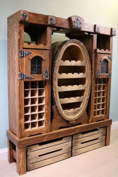 a large wooden cabinet with drawers and shelves