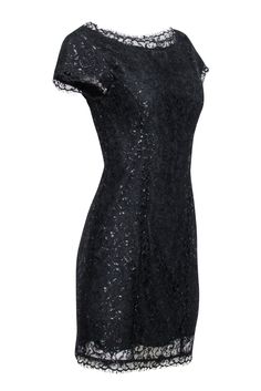 Upgrade your little black dress game with this sparkly stunner from Joie. The shimmering metallic lace adds a touch of twinkle to this dazzling dress. With its cap sleeve and bateau neckline, this number exudes elegance and flatters with its sheath silhouette. Pair with strappy silver heels for a glam look. Size S Shell 84% Nylon, 16% Metallic Lining 100% Polyester Hidden side zip Bateau neckline Cap sleeve Sheath silhouette Bust 31.5" Waist 26" Shoulder to hem 35.5" Evening Mini Dress With Lace Short Sleeves, Party Lace Mini Dress With Short Sleeves, Lace Mini Dress With Short Sleeves For Night Out, Lace Mini Dress With Short Sleeves For Party, Short Sleeve Mini Dress With Lace Trim For Evening, Short Sleeve Lace Mini Dress For Party, Stretch Lace Evening Dress, Elegant Cap Sleeve Dress For Night Out, Elegant Stretch Lace Dress For Night Out