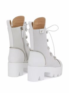 White leather Juliett platform lace-up boots from Giuseppe Zanotti featuring decorative zip detailing, round toe, pull-tab at the heel, front lace-up fastening, side zip fastening, platform sole and ridged rubber sole. | Giuseppe Zanotti Juliett platform lace-up boots Lace-up Calf Leather Combat Boots With Lug Sole, Leather High Ankle Heeled Boots With Laces, High Ankle Leather Heeled Boots With Laces, White High Ankle Lace-up Boots With Platform, Luxury White Heeled Boots, Lace-up Calf Leather Boots, Leather Platform Boots With Zipper Closure, High-top Lace-up Boots With Lug Sole In Calf Leather, Leather Lace-up Platform Boots With Zipper