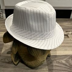 2/$15 Men’s Pinstriped Fedora Hat-One Size Fits Most. White W/Black Pinstripes. 109% Polyester. 1.75” Brim, 7” Crown, Diameter 23”. Like New-Sat On Shelf, Never Worn. Smoke Free And Pet Free Home. Bundle Sale-Bundle Listings W/ Emojis For 2/$15. Bx#6 Adjustable Striped Fedora Hat, Striped Fedora Hat For Spring, Casual Striped Hats For Spring, Casual Striped Spring Hats, Classic Striped Adjustable Hat, Classic Adjustable Striped Hat, Casual Striped Short Brim Hat, Casual Striped Brimmed Hat, Brand Accessories