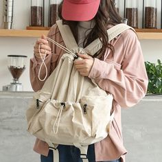 Detail: Item Type: Backpack Material: Canvas Lining Material: Canvas Closure Type: Lacing Style: Casual, Daily Size: Length: 31.00 cm/ 12.20 " Width: 16.00 cm/ 6.30 " Height: 35.00 cm/ 13.78 " Casual Satchel Backpack With Adjustable Straps, Casual Large Capacity Backpack For Daily Use, Everyday Solid Canvas Backpack, Solid Color Everyday Canvas Backpack, Casual Bags With Adjustable Straps For Students, Casual Backpack For Daily Use, Casual Student Bag With Adjustable Straps, Casual Beige Backpack For Everyday, Casual Solid Color Everyday Backpack