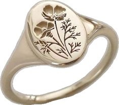 a ring with flowers engraved on it