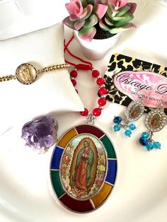 OUR LADY of GUADALUPE set. 3 pieces set. Earrings. Car charm. Bracelet. Adorable set ready to gift. Mom. Mother's Day. Sisters. Bff. Faith  beautiful gift set for someone special in your life or keep it to yourself  believe 💖 pray 💜 Nuestra Senora de Guadalupe 💜 Virgen de Guadalupe  you will receive exactly the 3 items in the picture.  shipping USA 🇺🇸 only. Multicolor Dangle Jewelry For Valentine's Day, Multicolor Jewelry For Valentine's Day Gift, Adjustable Spiritual Charms For Gifts, Spiritual Nickel-free Charm Bracelet For Gifts, Spiritual Nickel-free Charm Bracelet As Gift, Nickel Free Spiritual Jewelry And Charms For Gifts, Multicolor Jewelry Valentine's Day Gift, Nickel-free Spiritual Charm Bracelet As A Gift, Nickel-free Spiritual Jewelry And Charms For Gifts