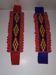 These Barrette's  were Handmade by me. I have been studying different tribal designs. I am trying to make items that will go to the heart of the people. Not just one band or blood title.🤩😍 This is in my book as a Cheyenne pattern. It is 41/2 Inches long and 3/4 of an inch wide. The beadwork is on Royal Blue or Bright Red Deerskin Suede Leather. The Beadwork Colors are Blue Iris, Red Luster, Yellow Luster, Pearl White, and black. I put fluted Beaded Trim around it. Please take a close look. Thank You for Your Interest! Lori Miller Red Beaded Bracelets For Festivals, Artisan Red Beaded Bracelets For Festivals, Traditional Red Handmade Beaded Bracelets, Traditional Red Beaded Bracelet For Festival, Southwestern Style Red Beaded Bracelets For Festival, Handmade Southwestern Red Beaded Bracelets, Traditional Red Beaded Bracelets, Blue Iris, Pow Wow