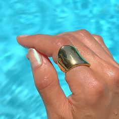 Show off your distinctive style with our unique irregular ring. Every piece is crafted to look stunning when worn solo or stacked. Daringly bold and delightfully misshapen. DETAILS: 18k Gold Plated Stainless Steel 100% Eco-Friendly; No Nickel, Chromium and Lead Water-resistant, sweat-proof, hypoallergenic and tarnish-free. You can work out in our durable jewelry, wear it to the beach, pool or even shower with it. Summer Clearance, Stylish Rings, Belly Chain, Hand Chain, Sweat Proof, Personalized Initials, Beach Pool, Polish Jewelry, Steel Jewelry