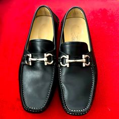 Used Men Loafers Like New No Box Classic Driving Shoes In Black Calfskin Leathers Adorned With A Gunmetal Gancini Bit And Personalized Rubber Sole They Are Ideal For Informal And Casual Looks . Pristine Condition Luxury Business Moccasins With Moc Toe, Luxury Semi-formal Plain Toe Moccasins, Luxury Plain Toe Moccasins For Business Casual, Designer Calf Leather Moccasins For Business Casual, Luxury Slip-on Formal Moccasins, Designer Business Casual Slip-on Moccasins, Designer Business Moccasins With Stitched Sole, Luxury Black Calf Leather Moccasins, Designer Business Moccasins With Leather Sole