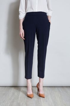 Sleek & timeless, this Slim Fit Ankle Pant is perfect for dressing up with its matching Single Button Blazer or pairing with Spring 's new knits and shirts. Featuring a slim leg & a pull on elastic back waistband, you will love the look & feel of these essential pants. T-Tahari Slim Fit Pant with Elastic Back Waistband Runs True to size Model is 5 '9 " and wearing a size S Imported Style #: THF17000A Essential Pants, Single Button Blazer, Slim Fit Pants, Slim Leg, Blazer Buttons, Pair Of Pants, Ankle Pants, Pull On Pants, Slim Legs