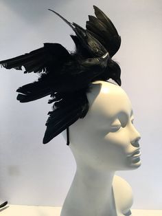 "Black Bird fascinator -Crow- The Birds- Halloween- Feather Headband -Derby- Ravens- goth- Steampunk- Mad Hatter Hello, I have one made so it can ship within a day or two. This fascinator is perfect to add whimsy and is just so fun you'll be the life of the party. A great conversation piece Wear this with a 1960's tweed suit and your \"the Birds\"! This black feather fascinator has 2 black feather bird... I call them Alfred and Tippy. It has great movement. It not a real bird, its styrofoam cove Adjustable Black Feathered Headpiece, Adjustable Black Feather Headpiece, Punk Mini Hats For Halloween Cosplay, Punk Black Mini Hat For Cosplay, Punk Style Black Mini Hat For Cosplay, Adjustable Black Fantasy Costume Hats And Headpieces, Adjustable Punk Headpieces For Costumes, Adjustable Punk Mini Hats For Halloween, Black Adjustable Punk Mini Hat