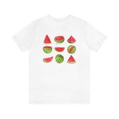 This summer shirt has a beautiful watercolor print of 6 watermelons. As for fruit shirts, this one is one of the most versatile for watermelon gifts, cottagecore shirts, or gardener gifts.Offered in the 6 most popular colors in cottage core: white, natural, heather peach, athletic heather, light blue, and heather ice blue. XS S M L XL 2XL 3XL Width, in 16.50 17.99 20.00 22.01 24.02 25.98 27.99 Length, in 27.01 27.9 29.02 3.00 31.02 32.01 32.99 Sleeve length, in 8.62 8.90 9.17 9.45 9.72 10.00 10. Red Fruit Print Tops For Summer, Multicolor Fruit Print Tops For Summer, Casual Summer Shirt With Fruit Print, Green Summer Shirt With Funny Print, Summer Short Sleeve T-shirt With Watercolor Print, Short Sleeve Summer T-shirt With Watercolor Print, Summer Watercolor Print Short Sleeve T-shirt, Cotton Vacation Tops With Fruit Print, Summer Cotton Shirt With Fruit Print