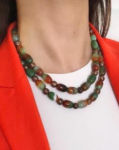 Agate and Lava Stone Multistrand Beaded Necklace ✅ NECKLACE FEATURES * Handmade Item: Each necklace is meticulously crafted by hand, ensuring quality and uniqueness. * Materials: patterned green and brown natural agate stone, brown lava stone, gold plated details and chain * Length: 43 cm (17 inches) + 5 cm (2 inches) adjustment chain.    -If you require a longer extension chain, please let me know. * Color Discrepancies: Please be aware that color variations may occur due to different monitor settings. * Natural Stone Variations: Natural stones may vary slightly in size, shape, and color tones due to their unique characteristics. These small differences make your jewelry special and one-of-a-kind. ⭐️ This elegant necklace features tube-shaped agate stones in green and brown tones, along w Agate Beaded Necklaces For Jewelry Making, Green Agate Beaded Necklaces With Colorful Beads, Vintage Beaded Necklace With Natural Stones, Green Agate Colorful Beaded Necklaces, Colorful Green Agate Beaded Necklaces, Beaded Agate Crystal Necklace, Elegant Agate Beaded Necklaces With Colorful Beads, Elegant Colorful Agate Beaded Necklaces, Bohemian Jade Necklace With Faceted Beads