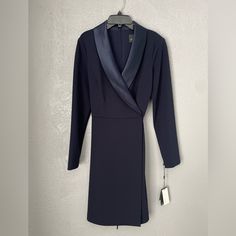 Navy Blue Long Sleeve Dinner Dress Navy Long Sleeve Midi Dress For Formal Occasions, Navy Dress For Fall Party, Formal Navy V-neck Midi Dress, Elegant Navy Midi Dress For Evening, Elegant Long Sleeve Lined Dress, Elegant Navy Midi Dress For Fall, Navy Long Sleeve Fitted Dress, Navy Midi Dress For Spring Evening, Elegant Long Sleeve Lined Midi Dress