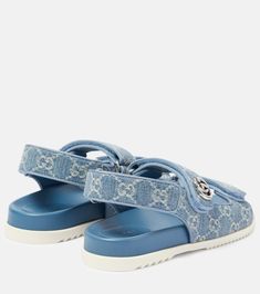 Double G GG denim sandals in blue - Gucci | Mytheresa Gucci Sandals With Buckle Closure For Summer, Gucci Open Toe Sandals With Rubber Sole, Gucci Blue Leather Sandals, Blue Gucci Leather Sandals, Blue Leather Gucci Sandals, Gucci Sandals With Cushioned Footbed For Spring, Designer Blue Slides For Summer, Gucci Sandals With Rubber Sole For Summer, Gucci Summer Slides With Round Toe