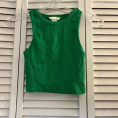 Never Worn, In Great Condition! Basic Green Sleeveless Crop Top, Green Sleeveless Basic Crop Top, Basic Green Tank Top For Spring, Green Cotton H&m Tops, H&m Sleeveless Stretch Tops, Sporty Green Crop Top For Spring, H&m Cotton Fitted Tank Top, H&m Green Tops For Spring, H&m Casual Stretch Tops