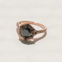 Jinx Hexagon Halo Black and Brown Diamond Ring in 14k Rose Gold (Size 6 Only) – Kobelli Luxury Rose Gold Octagon Ring, Modern Black Diamond Cut Rings, Luxury Black Diamond Ring With Rose Cut, Elegant Rose Gold Ring With Black Diamonds, Elegant Black Halo Rings, Elegant Rose Gold Rings With Black Diamonds, Modern Black Diamond Wedding Ring, Black Diamond Proposal Ring In Fine Jewelry Style, Black Diamond Round Ring For Proposal