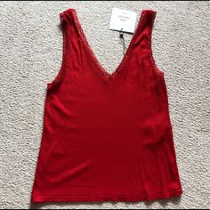 Zara Trafaluc Basic Red V Neck Ribbed Camisole Lace Trim Tank Top Tee Size Small New With Tags. Red Stretch V-neck Tank Top, Red Stretch Camisole For Spring, Fitted Red V-neck Camisole, Elegant Red Cami Tank Top, Elegant Red Camisole Top, Elegant Red V-neck Tank Top, Red Stretch Cami Top, Fitted Red V-neck Tank Top, Elegant Red Zara Tops