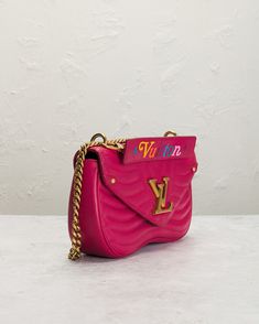 Pink calfskin leather with gold tone hardware with suede lining.  Made in France.  Flap top with push lock closure.  One main compartment.  Interior slip pocket.  Top handle with multi-color embroidered logo script, Gold-tone chain link shoulder strap.  Circa 2018.  Measures approx 10" W x 5.5" H x 3" D, Top handle with a 2" drop, Adjustable shoulder strap measures approx 21".  .  Good.  Light wear throughout.  Signs of use throughout.  Light rubs on corners.  Light scratches on hardware.  Light Pink Crossbody Shoulder Bag With Metal Logo, Pink Rectangular Bag With Metal Logo, Designer Flap Bag With Branded Hardware, Luxury Pink Bag With Metal Logo, Luxury Pink Bags With Metal Logo, Designer Pink Bag With Metal Logo, Luxury Everyday Flap Bag With Metal Logo, Luxury Everyday Use Flap Bag With Metal Logo, Luxury Pink Flap Bag