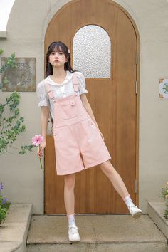 Extra sweet pink overalls with heart buttons, now in a shorter length for warmer days. Features a high waist boyfriend fit with roomy legs, side pockets and back pockets. S: 32" waist, 40" hips, 12" rise, 25" thighs, 6" inseamM: 33.5" waist, 41.5" hips, 12" rise, 26" thighs, 6" inseamL: 35" waist, 43" hips, 12" rise, 27" thighs, 6" inseam How to attach buckles:Slide the rectangular buckle on first, followed by the T-shaped buckle. Overall straps will hold on its own as such or you can slide the free end back into the rectangular buckle. Pink Overall Shorts, Peach Clothes Aesthetic, Cute Dungaree Outfits, Pastel Pink Outfit, Kawaii Kidcore, Cute Overall Outfits, Cute Dungarees, Kidcore Outfit, Dungarees Outfits