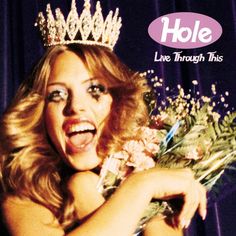 a woman wearing a tiara and holding flowers in front of her face with the words hole live through this