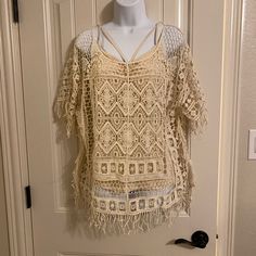 Crochet Fringe Poncho Pure White Beige Open Knit Cover-up, Spring Vacation V-neck Poncho, Beige Crochet Beachwear Top For Spring, Beige Crochet Top For Spring Beach Season, Beige Crochet Top For Spring Beachwear, Spring Vacation Poncho With Fringe, Fringe Poncho For Vacation, Fringe Poncho For Summer, Casual Summer Poncho With Fringe