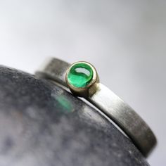 Modern Colombian Emerald Engagement Ring Solid Silver 18K Yellow Gold Minimalistic Green Cabochon - Beryl Dome by NangijalaJewelry on Etsy Modern Round Emerald Ring For Formal Occasions, Modern Green Emerald-cut Jewelry, Modern Formal Emerald Jewelry, Modern Polished Emerald Ring For Anniversary, Yellow Gold Emerald Ring With Tension Setting As Gift, Modern Round White Gold Emerald Ring, Modern Wedding Emerald Ring With Polished Finish, Modern Oval Green Jewelry, Modern Green Jewelry For Formal Occasions