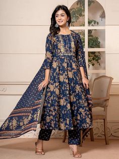 Product Details  Navy Blue embroidered Kurta with Trousers with dupatta Kurta design: Floral embroidered Anarkali shape Regular style Round neck, three-quarter regular sleeves Na pockets sequinned detail Calf length length with flared hem Pure cotton machine weave fabric Trousers design: Printed Trousers Elasticated waistband Slip-on closure   Size & Fit The model (height 5'8) is wearing a size S Material & Care   Top Fabric 100% Pure Cotton Bottom Fabric Pure cotton Dupatta Fabric Pure cotton S Indian Anarkali Suits, Diwali Dress, Pakistani Gown, Simple Indian Suits, Diwali Dresses, Dress Pakistani, Dress Trendy, Kurta Design, Suit For Women