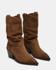 Crafted from high-quality suede, the STETSON boot exudes a rugged Western charm. Its pointed toe design adds a touch of sophistication, making it the perfect option for any occasion. Don't compromise on style or comfort with this versatile and durable boot. 2.75 inch heel height 12.5 inch shaft circumference 8.25 inch shaft height Suede upper material Unlined Synthetic sock Synthetic sole Imported Western Boots Women, Western Boot, Toe Designs, Suede Boots, Western Boots, Women's Boots, Chestnut, Trending Shoes, Steve Madden