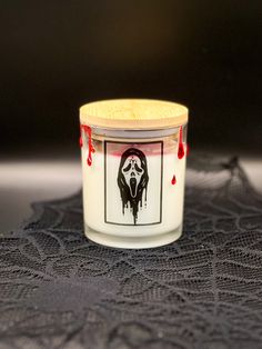 a candle that has been placed on a doily