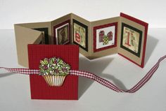 an open card with some pictures on it and a ribbon around the edges that is attached