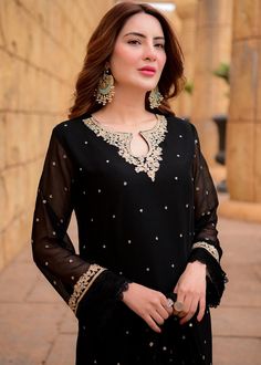 ✨This beautiful black embroidered Georgette kurta has delicate hand embroidery over the neck and sleeves with small sequin motifs all over the top and dupatta.It has matching silk pant. ✨Dazzle with this elegant dress in any party or wedding function. ✨We stitched outfit with lot of care, so that our customers should not have any issues regarding finishing and fitting. ✨This dress can be customise in any other colour and in all size, please contact us regarding any changes if you want.We will ma Pakistani Suit Salwar, Georgette Salwar Suit, Georgette Kurta, Eid Dress, Afghan Clothes, Eid Dresses, Kurtis With Pants, Pakistani Suits, Silk Pants