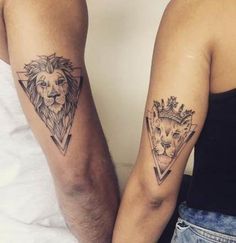 two people with tattoos on their arms and one has a lion and triangle in the middle