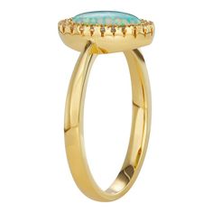 Love your look with this impressive ring. Love your look with this impressive ring. Packaging: boxed Metal: sterling silver Plating: 18k gold Additional details: nickel free Width: .44in Finish: polished STONE DETAILS Stone type: lab-created opal, lab-created white sapphire Total weight: 7/8 ct. Center stone weight: 3/4 ct. Center stone size: 8.5 mm x 7 mm Setting: glue/epoxy, micro prong Shape: cabochon, round Color: Blue. Gender: female. Age Group: adult. Material: Gold Over Sterling. Ring Packaging, Vintage Style Outfits Retro, Silver Lab, Outfits Retro, White Sapphire Ring, Opal White, Casual Heels, White Sapphire, Vintage Style Outfits