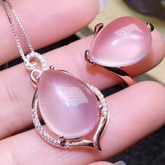 Welcome to Elegant Art Jewelry!  Stone: Natural Rose Quartz Stone Size: ( 13mm×18 Pendant ), ( 12mmx16mm Ring ) Side Stone: Zircon Metal: 925 Sterling Silver Personalization: 9K/14K/24K/GOLD/SILVER/PLATINUM/ROSE-GOLD/WHITE GOLD. (Contact me)  Rose Quartz Pendant, Rose Quartz Cuff Pendant, 925 Sterling Silver Pendant, Oval Shape Pendant, Rose Quartz Pendant, Rose Quartz Engagement, Open Design Pendant, Rose Quartz Oval, Rose Quartz Natural, Pink Rose Quartz, Pink Rose Quartz, Gemstone Pendant, Ro Rose Gold Cabochon Pendant Jewelry, Pink Drop Jewelry For Anniversary, Pink Cabochon Jewelry For Anniversary, Pink Cabochon Jewelry For Wedding, Pink Cabochon Jewelry For Formal Occasions, Pink Cabochon Wedding Jewelry, Drop Shaped Cabochon Jewelry For Anniversary, Fine Jewelry Pink Cabochon, Formal Pink Rose Quartz Jewelry