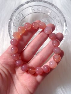 "You will receive one chunky Yan Yuan Agate crystal bracelet. So gemmy and peachy - These beads remind me of gummy candy! This bracelet is made \"one size\" and stretches to fit. Bead size: 11mm Bracelet size: 7mm * * * * * ABOUT YANYUAN AGATE: Yanyuan agate, named after Yanyuan County in Sichuan, China, is a variety of banded chalcedony, a mineral of the quartz family. Yanyuan Agate is one of the most rare Agate. It has a naturally large range of colours. Like all Agate, it is said to helps in Pink Agate Healing Bracelet, Agate Gemstone Beads Crystal Bracelet, Round Agate Gemstone Beads Crystal Bracelet, Agate Gemstone Crystal Bracelet With Round Beads, Agate Crystal Bracelet With Gemstone Beads, Round Agate Crystal Bracelet With Gemstone Beads, Pink Agate Jewelry With 8mm Beads, Pink Agate Spiritual Bracelets, Pink Agate Bracelets With 8mm Beads