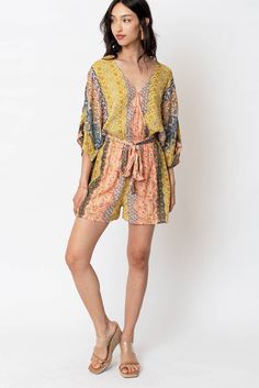 Introducing the Multi Print Belted Romper, a chic and playful ensemble for any occasion. Crafted from 99% viscose and 1% metallic fibers, this romper offers a luxurious feel with a hint of shimmer. The multi-print design adds a vibrant touch, while the included belt cinches the waist for a flattering silhouette. Whether you're out for brunch or hitting the town, this romper combines comfort and style effortlessly. Belted Romper, Wild Rag, Pets For Sale, Cowboy Boots Women, Printed Rompers, Hat Band, Kids Boots, Purse Wallet, Belt Buckles