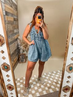 Pleated denim romper with tie front closure and POCKETS! Soft pleated denim Romper Pockets on both sides Tie front closure Oversized for Olivia is 5’2”, usually a medium top and bottoms, 34C, 29” waist wearing a size medium Jean Romper Outfit, Denim Romper Outfit, Lace Undershirt, Trendy Mom Outfits, Summer Country, Concert Fit, Simple Closet, Pleated Denim