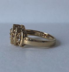 "This is a really great Vintage Diamond ring. It has a center marquise shape and interesting half marquise shapes going down on each side. The five shapes can symbolize 5 children and would make a perfect \"Mother's Ring\" It is crafted in 14k yellow gold sometime between 1970s-198s Holds .24ct of round diamonds of high quality. G-H VS1 Clarity. Size 7.5 (sizable upon request) Every Antique piece of jewelry we sell at Heirloom Pavé has been checked for safety of each prong and repaired as needed Gold Cluster Ring With Vs Clarity, Emerald Cut Diamond Accent Promise Rings, Emerald Cut Rings With Diamond Accents For Promise, Emerald Cut Promise Ring With Diamond Accents, Cluster Diamond Ring With Vs Clarity For Promise, Yellow Gold Cluster Ring With Diamond Cut, Cluster Birthstone Promise Ring With Center Stone, Cluster Diamond Cut Ring For Anniversary, Gold Cluster Diamond Promise Ring