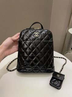 Chanel 22A Quilted My Pocket BackpackBlack Coated Calfskin LGHWSize 24 x 22 x 9 cmMicrochipJuly 20229.9/10 New Kept Unused (inevitable hairline on hardware and minimal storage sign otherwise new)Includes full set box, dust bag and receiptRTP 6500 sgd Price now 4880 sgd 3620 usd CN5673-02 High-end Backpack Style Shoulder Bag, High-end Rectangular Backpack For Daily Use, High-end Black Backpack Shoulder Bag, High-end Backpack For Daily Use, Classic Formal Backpack With Dust Bag, High-end Black Backpack For Daily Use, High-end Black Backpack, High-end Leather Backpack, Designer Rectangular Backpack For Formal Occasions