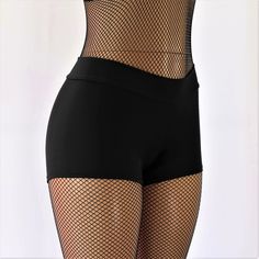 "These shorts feature a black tricot spandex, a 2\" thick waistband, and a full coverage back. The fabric has a very nice 4-way stretch and is breathable to allow for all day wear. These are perfect for all activities such as dancing, workouts, yoga, and the beach. The shorts here are offered in mid rise (pictured) with the option for a high waist (not pictured). STYLE OPTIONS Mid Rise (pictured) High Waist (not pictured) SIZING INFO ⭐Sizing Chart in Photos⭐ If you need help with sizing, send me Dance Pole, Panty Liner, Cheer Dance, Black Matte, Burning Man, Sizing Chart, High & Low, Mid Rise, High Waist