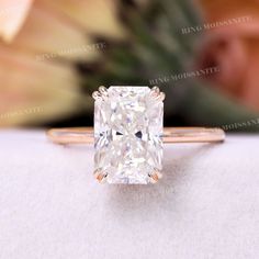 an engagement ring with a cushion cut diamond