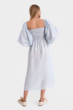 The bestselling Atlanta dress from Sleeper is a fashionista favorite. Perfect for brides' getting ready looks or mamas-to-be at their baby shower, this 100% linen dress features a square neckline and smocked bodice in a blue gingham print. The Atlanta midi's romantic, blouson sleeves can be worn on or off the shoulder. Comes with a matching hair scarf. Available in lavender, blue vichy and ivory silk. Square Neck Linen Midi Dress With Smocked Back, Square Neck Linen Day Dress, Square Neck Ruched Dresses For Picnic, Daywear Smocked Dress With Square Neck, Square Neck Dress With Smocked Back For Picnic, Chic Linen Smocked Dress For Spring, Spring Linen Dress With Square Neck For Daywear, Chic Linen Dress With Square Neck For Brunch, Spring Square Neck Linen Dress For Daywear