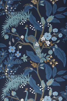 a blue wallpaper with birds and flowers on it's side, in front of a dark background