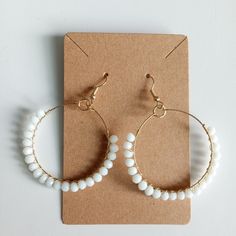 White Beaded Dangle Earrings New Lightweight Trendy White Hoop Earrings With Pearl Drop, White Dangling Hoop Earrings With Colorful Beads, White Dangle Hoop Earrings With Colorful Beads, Colorful Beads Pearl Earrings, White Round Beaded Earrings With Pearl Drop, White Beaded Earrings With Pearl Drop, White Wire Wrapped Round Bead Earrings, White Beaded Pearl Drop Earrings, White Pearl Beaded Bohemian Earrings