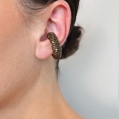 This Earcuff is sold as a single unit piece for use on one ear. Non-adjustable design COLOR: BROWNHEIGHT: 3 cm / 1.2 in WIDHT: 1.1 cm / 0.4 in WEIGHT: 6 gr / 0.2 oz UNITMATERIALS: Glass Beads, resin. Our jewelry is hand-creafted with the utmost care and a slight variation may exist between pieces. Our metallic parts are composed of 24kt gold plated bronze or Rhodium plated silver 925. Adjustable Brass Single Ear Cuff, 24kt Gold, Ear Cuffs, Small Detail, Ring Collections, Design Color, Earring Necklace, Ring Necklace, Rhodium Plated