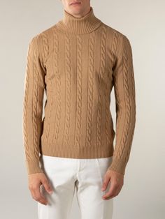 These Aurélien Dolcevita Cable Knit Sweater Beige for Men Large symbolize Mediterranean style and ultimate comfort. A combination of traditional details and a contemporary twist. This model is made in  Cashmere. The  Sweater are made entirely by hand in Italy. For exclusive, luxurious and handmade Italian Sweater you've come to the right place at Aurélien! Classic Textured Knit Turtleneck, Fitted Beige Polo Sweater For Winter, Fitted Cable Knit Sweater With Funnel Neck, Fitted Classic Beige Sweater, Classic Fitted Knitted Sweater, Fitted Brown Sweater With Ribbed Collar, Fitted Beige Cable Knit Sweater, Classic Brown Cable Knit Sweater, Classic Textured Knit Turtleneck Sweater