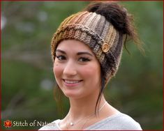 a woman wearing a knitted headband and smiling