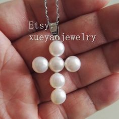 Welcome to my shop my dear friend. I hope you will like my jewelry, and most of my jewelry are made by myself. Please see the detail for this item:Pearl Jewelry: pendantmaterial: cultured freshwater pearlSize: around 8-9 mmPearl Color:whitecross size: around 25-35 mmAbout shipping:I will send out your order in 1-3 business days from China. 1, To United States, will use US E-packet shipping service , usually will 7-15 business days to finish delivery. But the orders should not less than 10$. Hope Elegant White Crucifix Pearl Necklace, White Cross-shaped Pearl Pendant Necklace, White Cross-shaped Pearl Necklace With Pendant, White Cross Pearl Pendant Necklace, White Crucifix Pearl Necklace As A Gift, White Pearl Drop Cross Pendant Jewelry, White Pearl Drop Cross Necklace, White Pearl Drop Necklace With Cross Shape, White Cross-shaped Pearl Drop Necklace