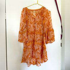 Super Cute And Perfect For Vacation. Can Fit Xs To M Summer Mini Dress In Orange, Orange Dress For Spring Beach Cover-up, Orange Beach Cover-up Dress For Spring, Orange Floral Print Dress For Beach, Orange Long Sleeve Dress For Beach Cover-up, Orange Tunic Dress For Beach Cover-up, Orange Long Sleeve Beach Cover-up Dress, Flowy Tunic Mini Dress For Brunch, Fitted Tunic Dresses For Brunch