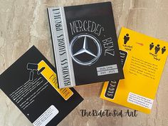 three books with mercedes's day written on them, one is yellow and the other is black