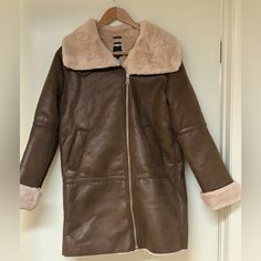 Size S Never Worn, New Without Tag Very Warm Beautiful Coat Chic Brown Shearling Outerwear, Beige Leather Outerwear With Faux Fur Lining, Brown Outerwear With Faux Fur Trim For Work, Brown Long Coat With Faux Fur Lining, Brown Shearling Outerwear For Work, Brown Leather Jacket With Faux Fur Lining For Work, Brown Leather Fur Coat For Workwear, Zara Beige Leather Jacket For Winter, Zara Brown Long Coat